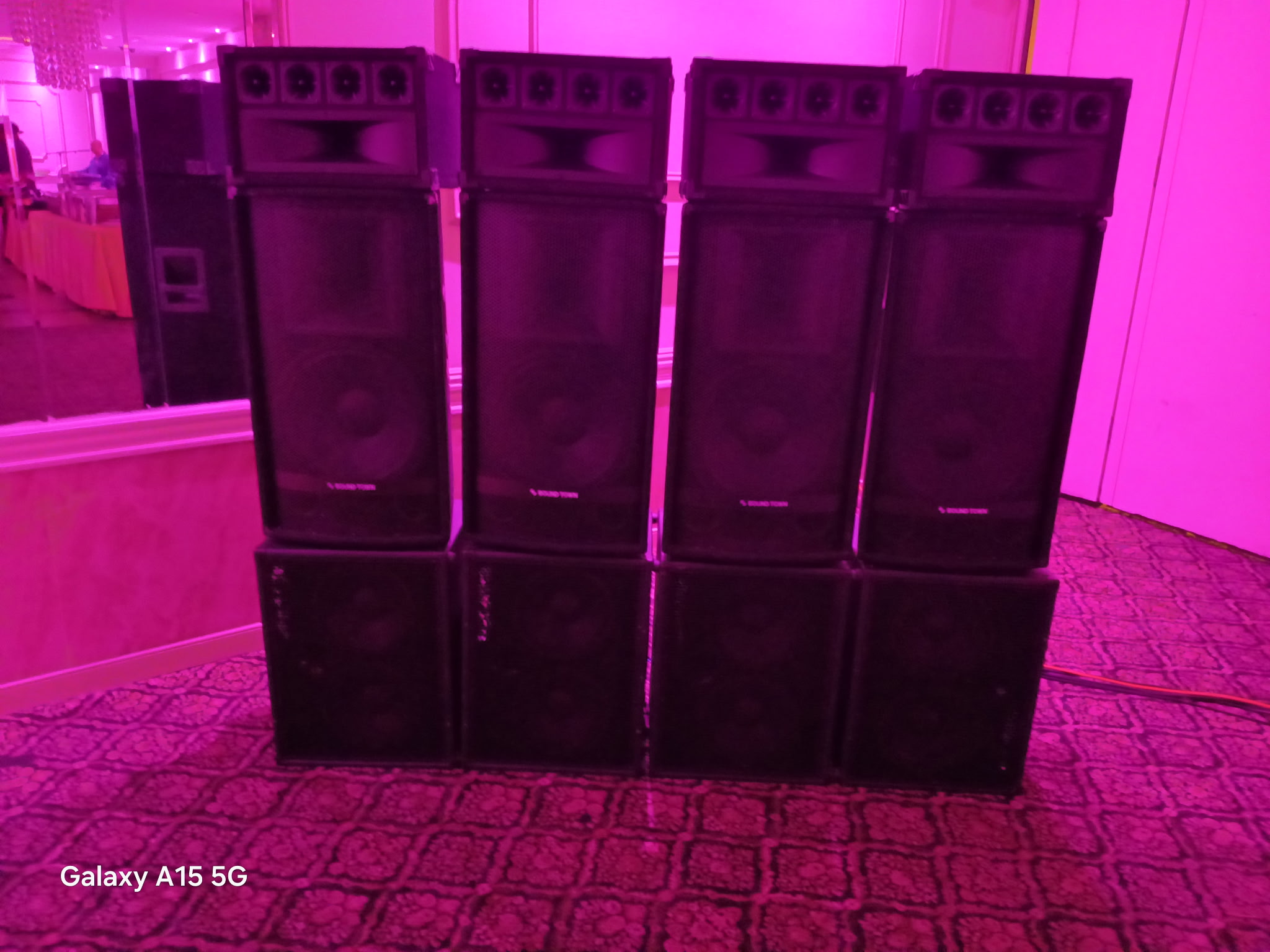 Professional sound equipment stack with speakers and subwoofers