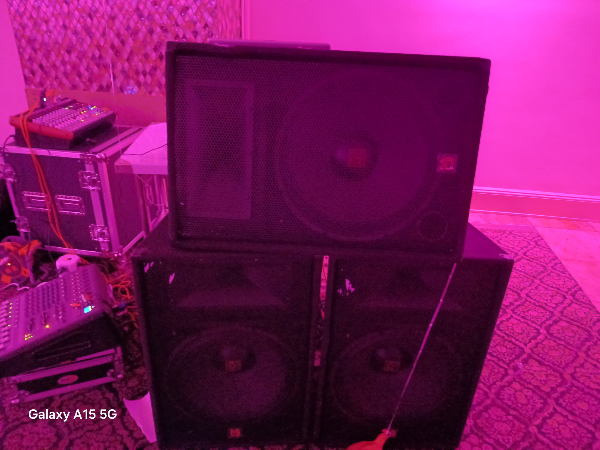 DJ computer setup with monitor and PC tower